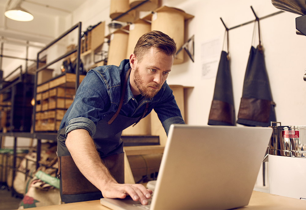 Man working on computer in office